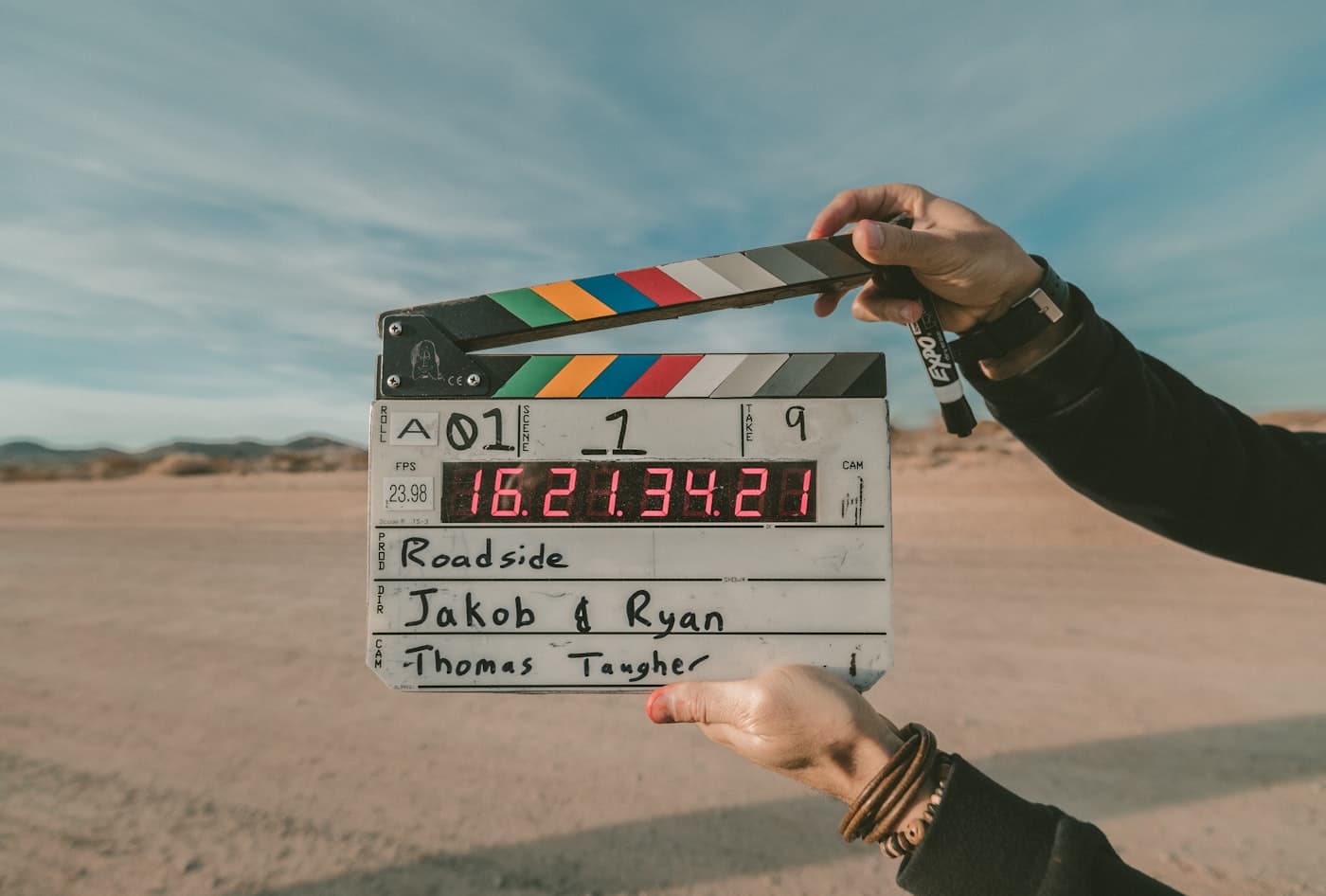 Film clapperboard held up on set before a take