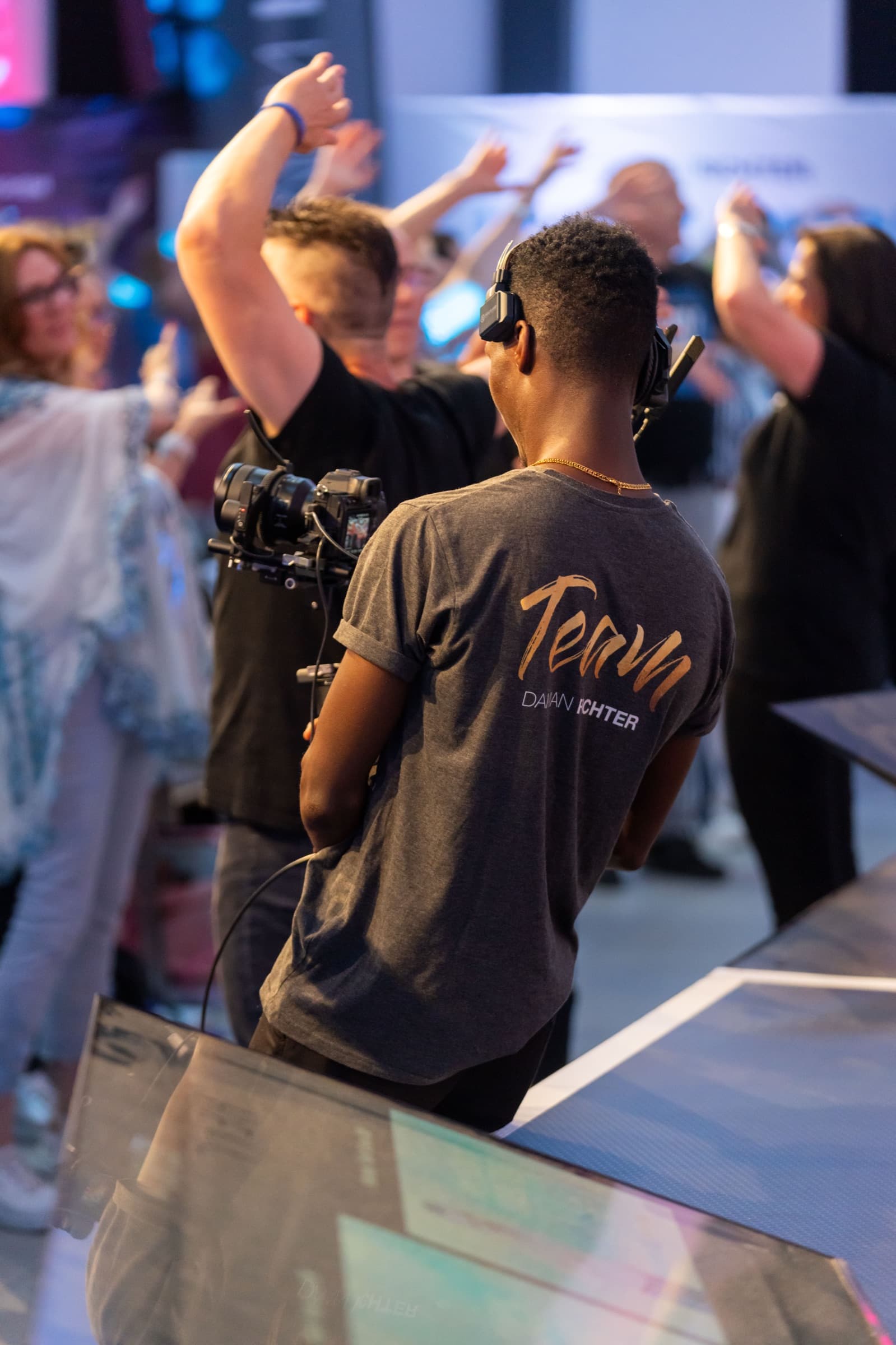 Aminu Hassan Iradukunda (Creative Aminu) on set as videographer for Damian Richter