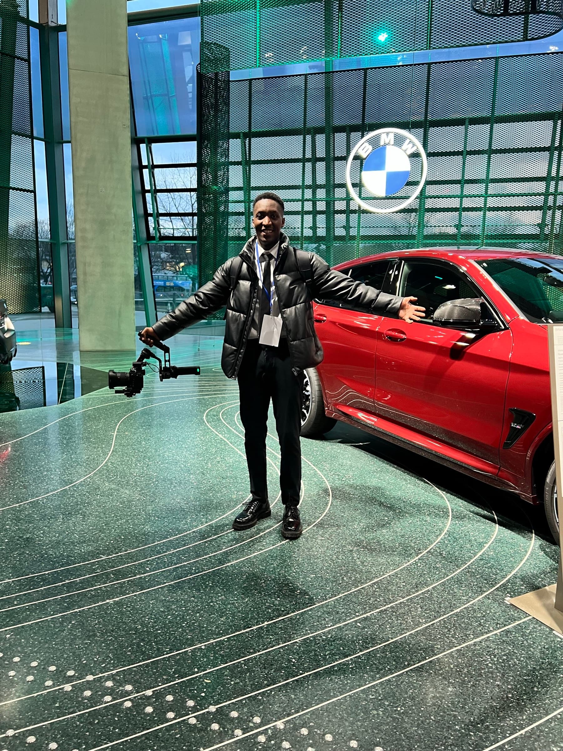 Aminu Hassan Iradukunda (Creative Aminu) filming a production for BMW