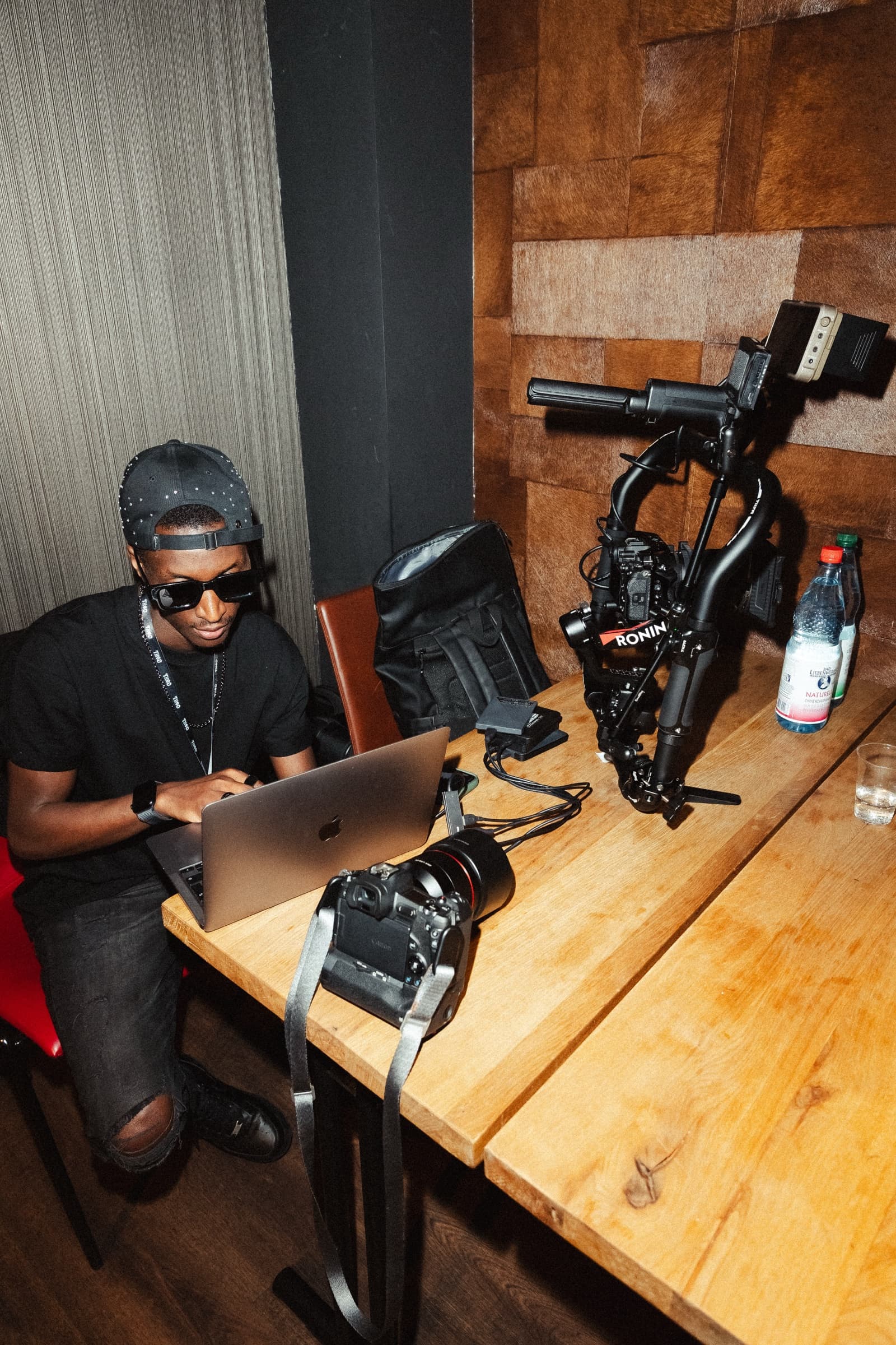 Aminu Hassan Iradukunda (Creative Aminu) editing on set during production