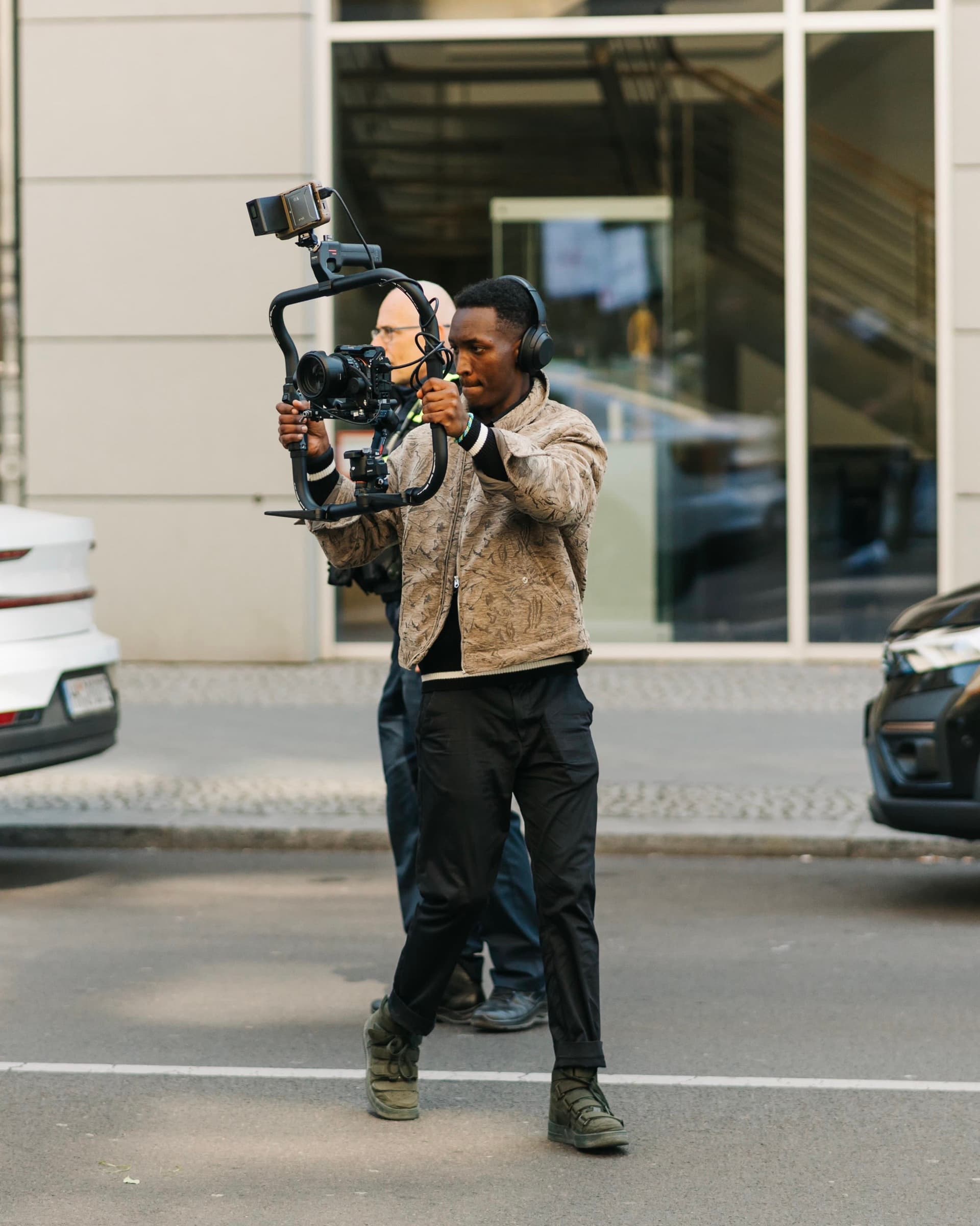 Aminu Hassan Iradukunda (Creative Aminu) on set during a shoot