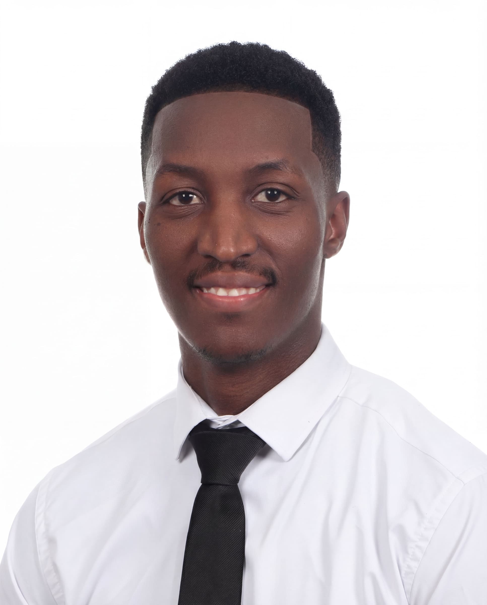 Formal studio headshot of Aminu Hassan Iradukunda (Creative Aminu) in a white shirt and tie