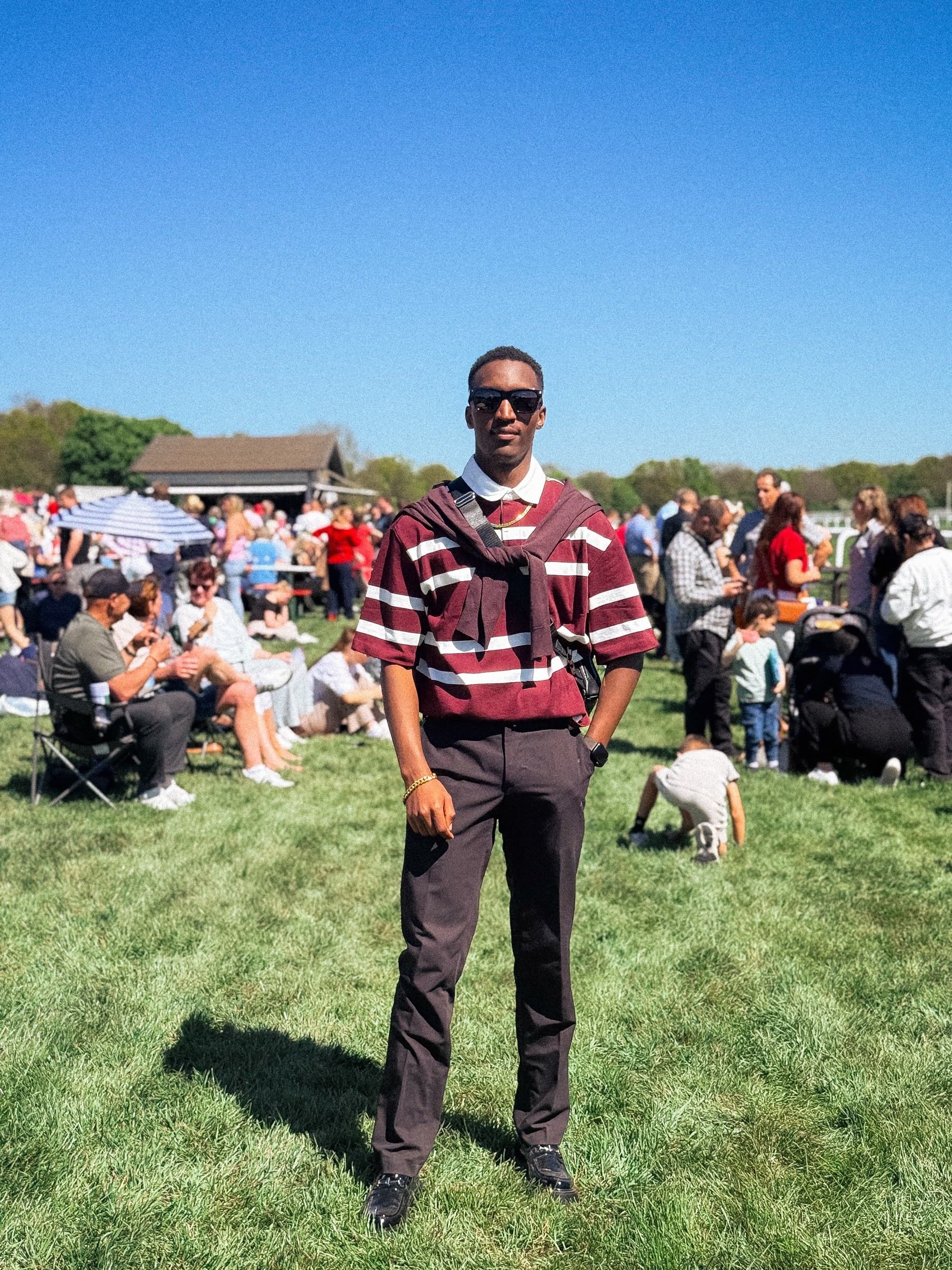 Aminu Hassan Iradukunda (Creative Aminu) at a horse racing event